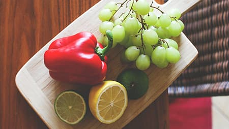 Fruits and vegetables on a wooden board
