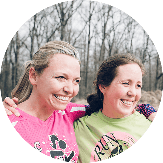 Two women smiling outdoors