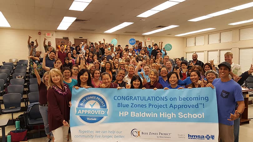 School employees celebrating approval